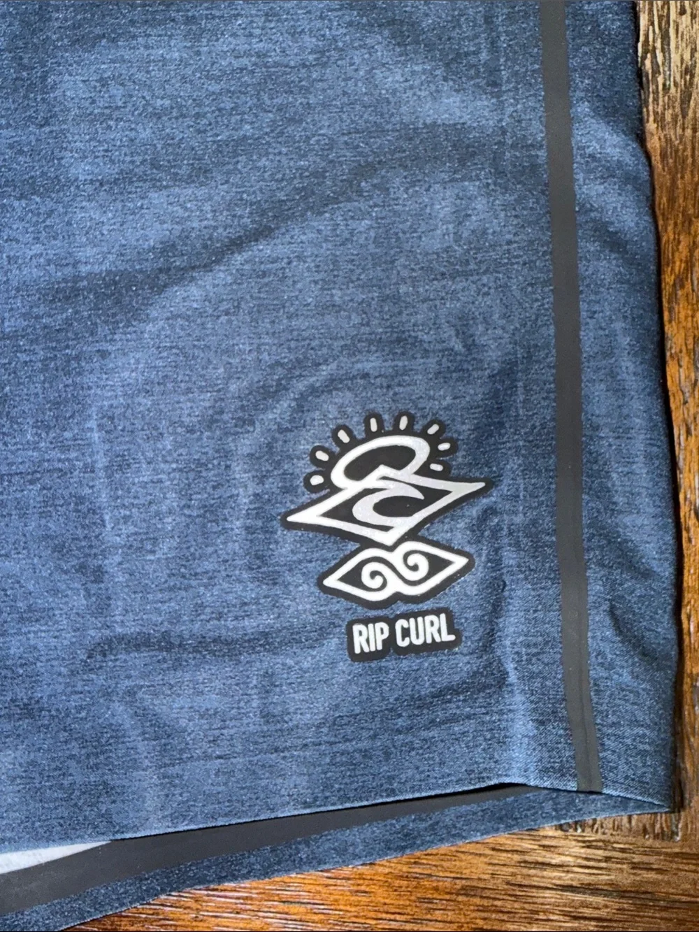 Rip Curl Mirage Mick Fanning Navy Board Shorts with Red & Aqua Stripes 34